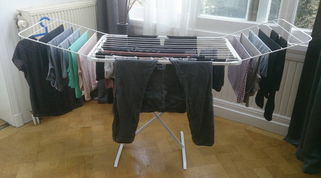 https://laundrytowear.com/wp-content/uploads/2021/10/how-to-dry-clothes-quickly-without-a-dryer.jpg