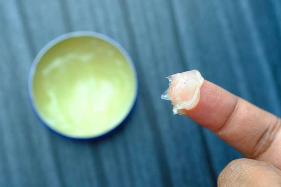 how to get petroleum jelly out of clothes